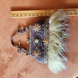 Mary Frances unique leather, metal, beads and fur purse.